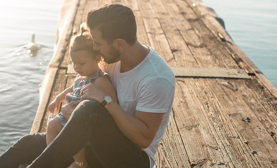 Father and Daughter on Pier