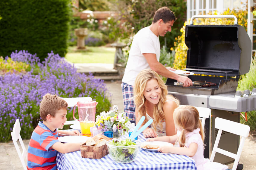 Family having a backyard picnic